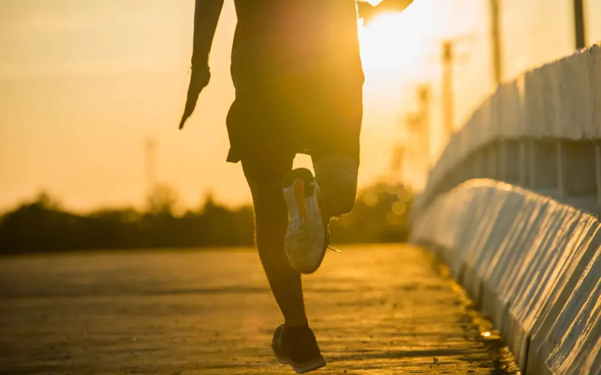 silhouette-young-fitness-man-running-sunrise